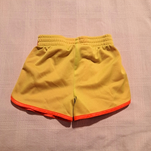 Under Armour girls size 5 yellow with orange accent shorts - Picture 4 of 4